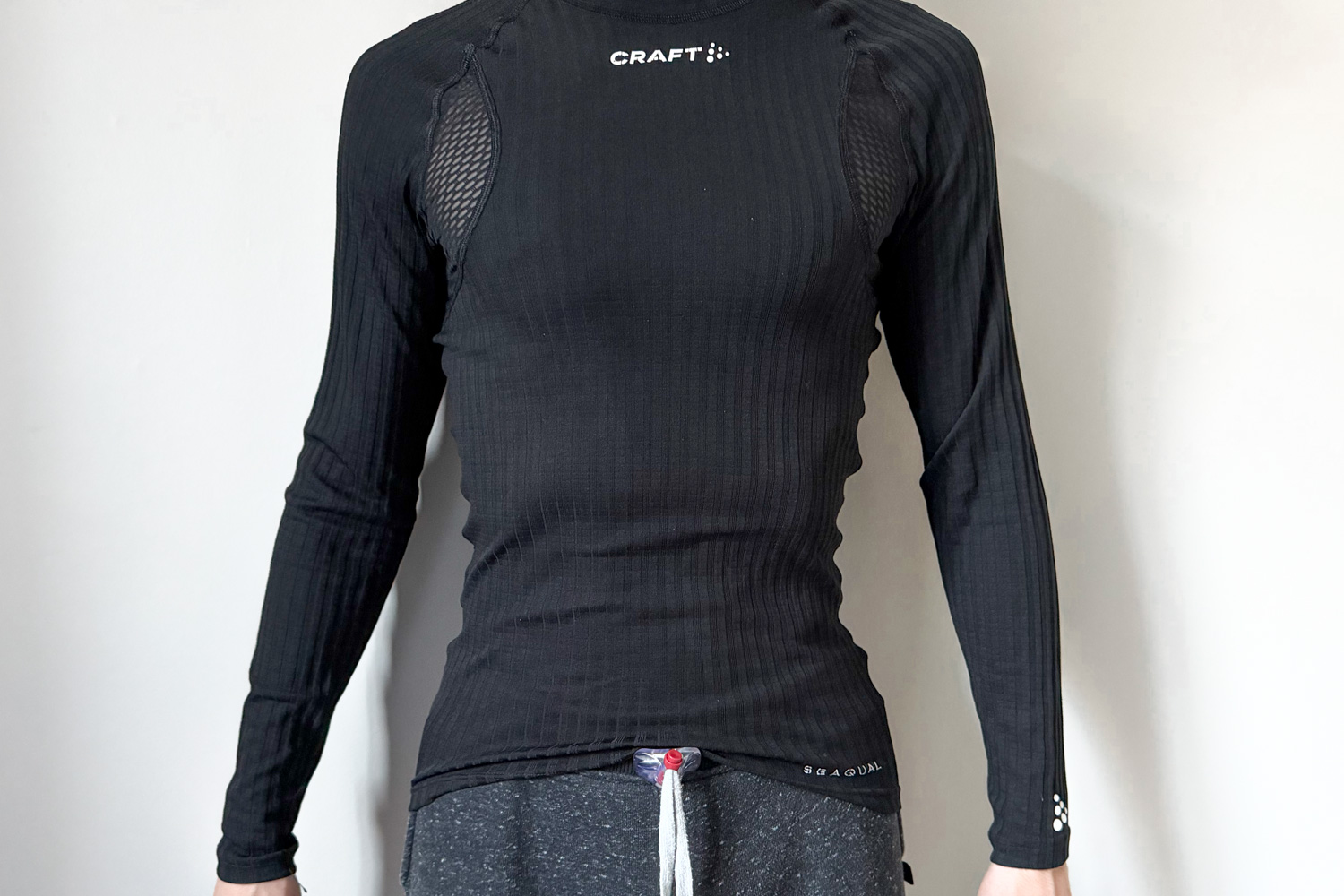 Sous-couche technique Craft Active Extreme portée en running, vue de face montrant la coupe ajustée.